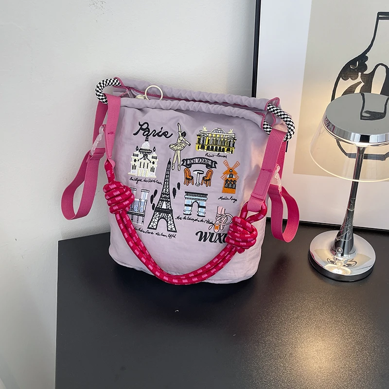 Women's Paris Landmark Embroidered Bucket Bag, Lightweight Nylon Crossbody & Shoulder Tote with Colorful Rope Strap
Women's Paris Landmark Embroidered Bucket Bag, Lightweight Nylon Crossbody & Shoulder Tote with Colorful Rope Strap