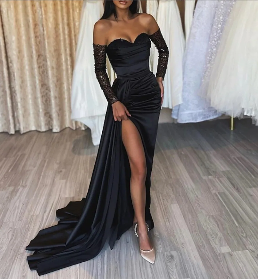 weetheart Neckline Strapless Long Sleeve Cold Shoulder Evening Gown Sparkling High Side Slit Sequin Panel Stacked Pleats Design
weetheart Neckline Strapless Long Sleeve Cold Shoulder Evening Gown Sparkling High Side Slit Sequin Panel Stacked Pleats Design