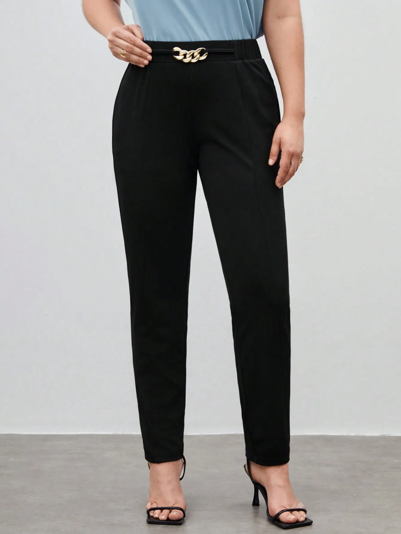 Plus Size Solid Black Trousers with Gold Chain Belt Detail
Plus Size Solid Black Trousers with Gold Chain Belt Detail