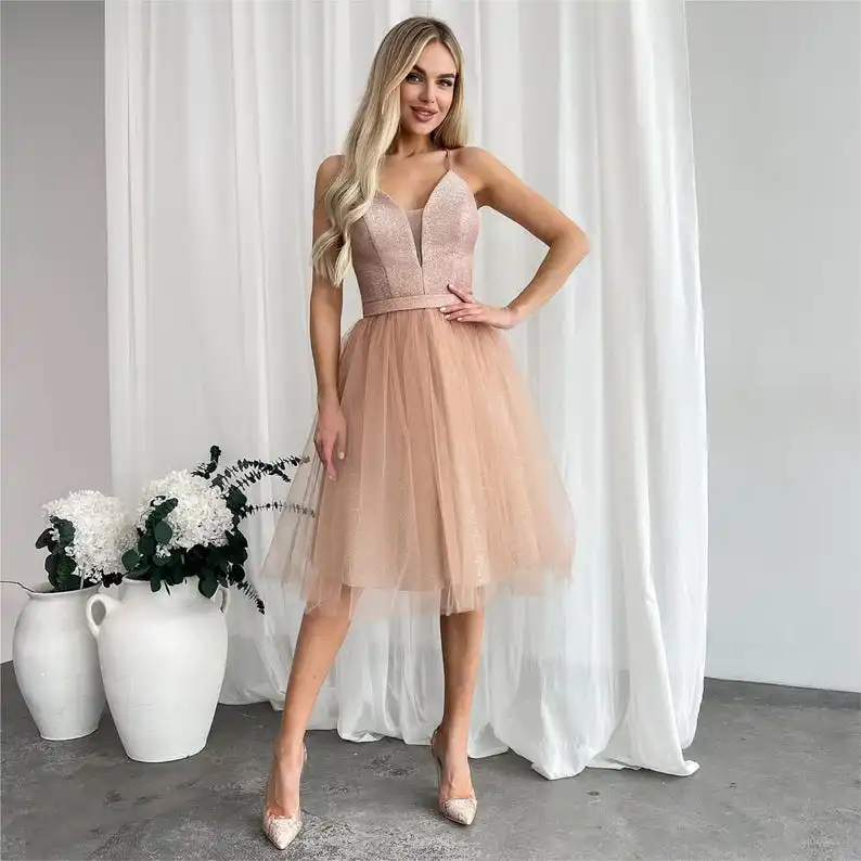 Festive shimmer knit dress with tulle skirt and lace-up back Fairy-tale and corset cocktail dress.
Festive shimmer knit dress with tulle skirt and lace-up back Fairy-tale and corset cocktail dress.