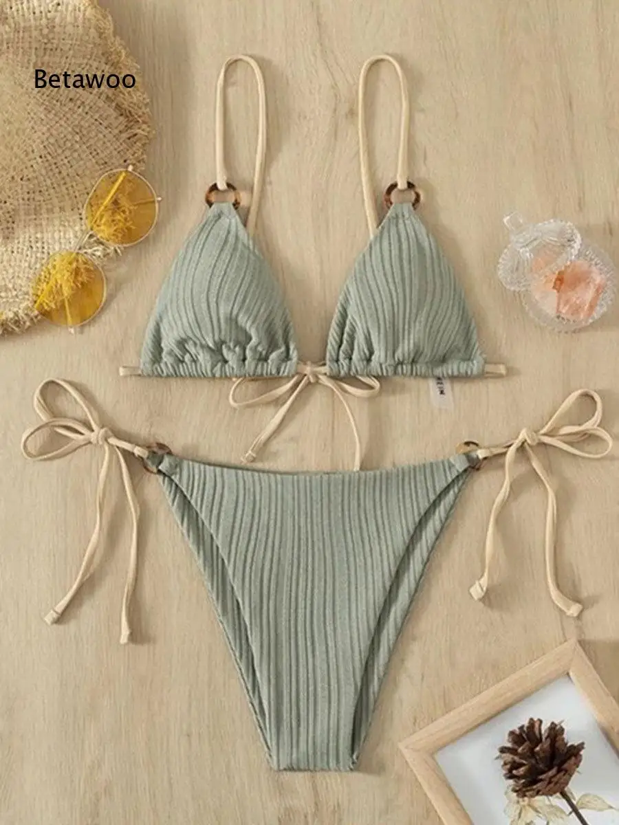 Neutral Tone Ribbed Wooden Accent Halter Two Piece Bathing Suit
Neutral Tone Ribbed Wooden Accent Halter Two Piece Bathing Suit