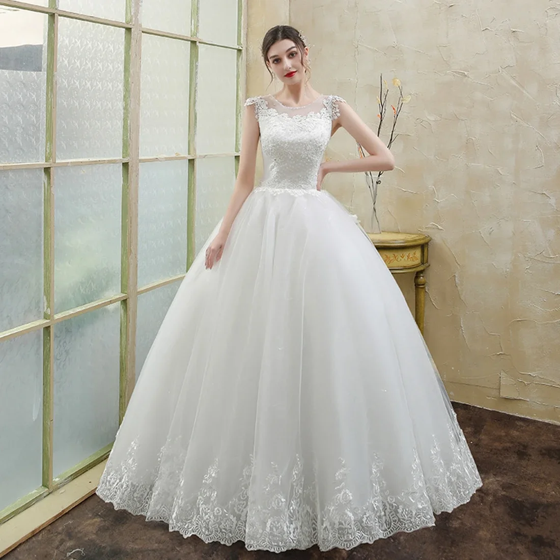 New Style Bespoke Wedding Dress with Appliques and O-Neck Floor-Length A-Line Bridal Gown customized
New Style Bespoke Wedding Dress with Appliques and O-Neck Floor-Length A-Line Bridal Gown customized