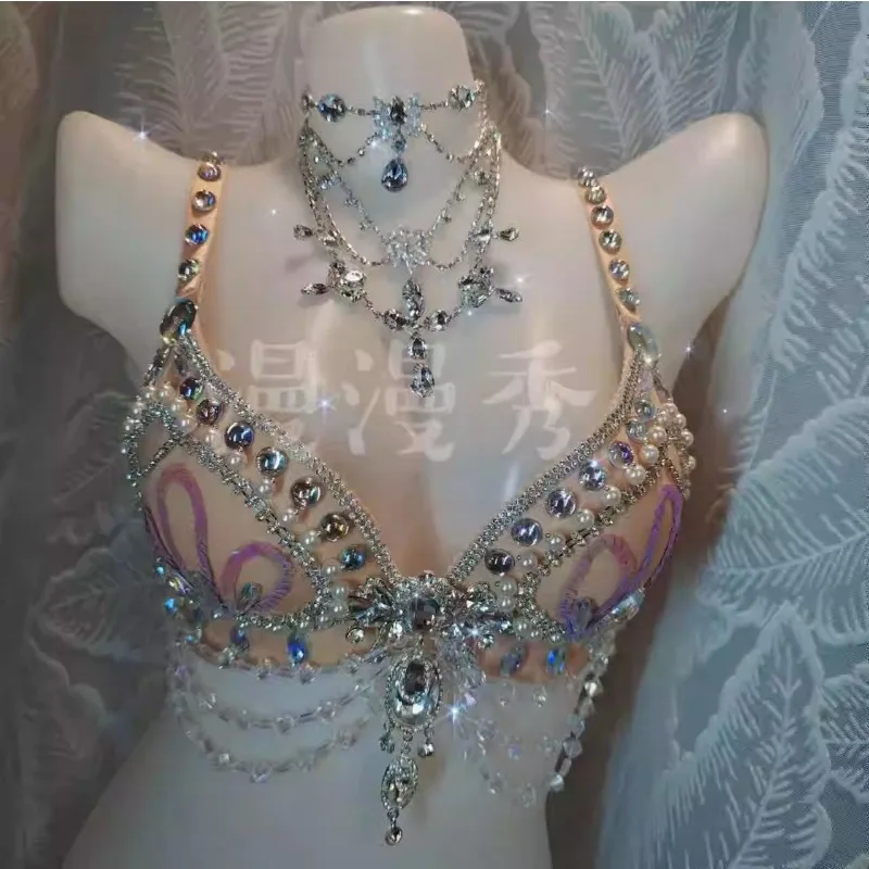 Индивидуальная жемчужная цепочка со стразами и кристаллами, блестящий корсет, роскошный и сексуальный наряд для выступлений, бюстгальтер с вороном, EDM, электронные силы
Индивидуальная жемчужная цепочка со стразами и кристаллами, блестящий корсет, роскошный и сексуальный наряд для выступлений, бюстгальтер с вороном, EDM, электронные силы