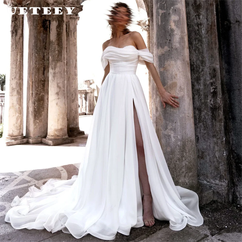 UETEEY Customized Simple Off Shoulder V Neck Chiffon Wedding Dress Women Elegant A Line Zipper Back High Slit Train Bridal Gown
UETEEY Customized Simple Off Shoulder V Neck Chiffon Wedding Dress Women Elegant A Line Zipper Back High Slit Train Bridal Gown