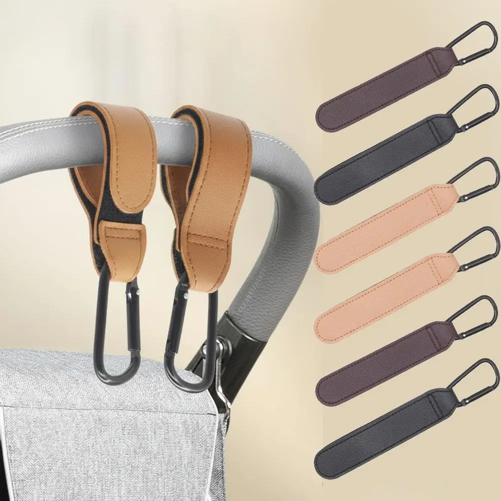 2Pcs PU Leather Stroller Hooks Versatile Stroller Handle Hanger Diaper Bag Purse Grocery Organizer Hook Stroller Accessories
2Pcs PU Leather Stroller Hooks Versatile Stroller Handle Hanger Diaper Bag Purse Grocery Organizer Hook Stroller Accessories