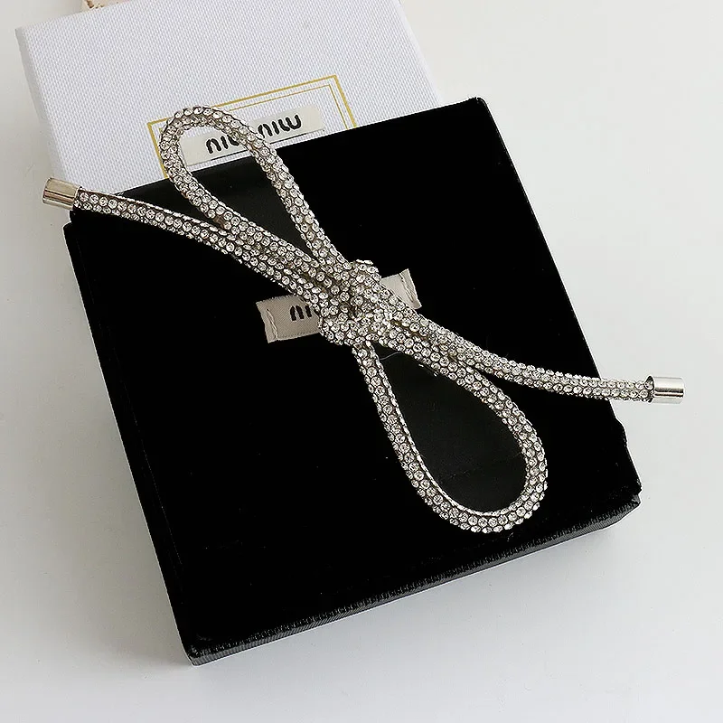 Glamorous Rhinestone Bow Hair Clip Snap Clip for Side Bangs & Half Updos Viral Hair Accessory for Spring 
Glamorous Rhinestone Bow Hair Clip Snap Clip for Side Bangs & Half Updos Viral Hair Accessory for Spring