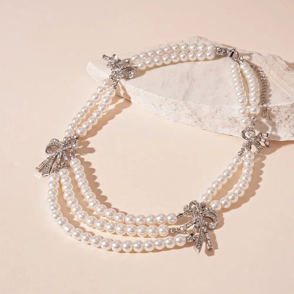 Jewelry Vintage Imitation Pearl Necklace Temperament Elegant Multi-layer Chain Light Luxury Shiny Bow Collarbone Chain Party
Jewelry Vintage Imitation Pearl Necklace Temperament Elegant Multi-layer Chain Light Luxury Shiny Bow Collarbone Chain Party