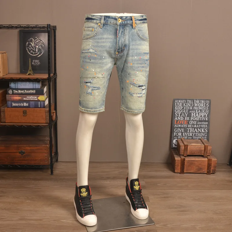 Summer vintage vintage light colored ripped denim shorts for men, stretch casual spray painted printed five quarter pants
Summer vintage vintage light colored ripped denim shorts for men, stretch casual spray painted printed five quarter pants
