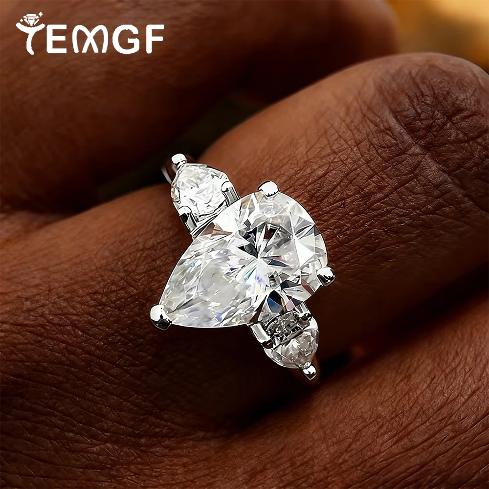 TEMGF Pear Cut All Moissanite Rings for Women 925 Sterling Silver 18K Plated 3 Stones Waterdrop Shape Engagement Wedding Band
TEMGF Pear Cut All Moissanite Rings for Women 925 Sterling Silver 18K Plated 3 Stones Waterdrop Shape Engagement Wedding Band