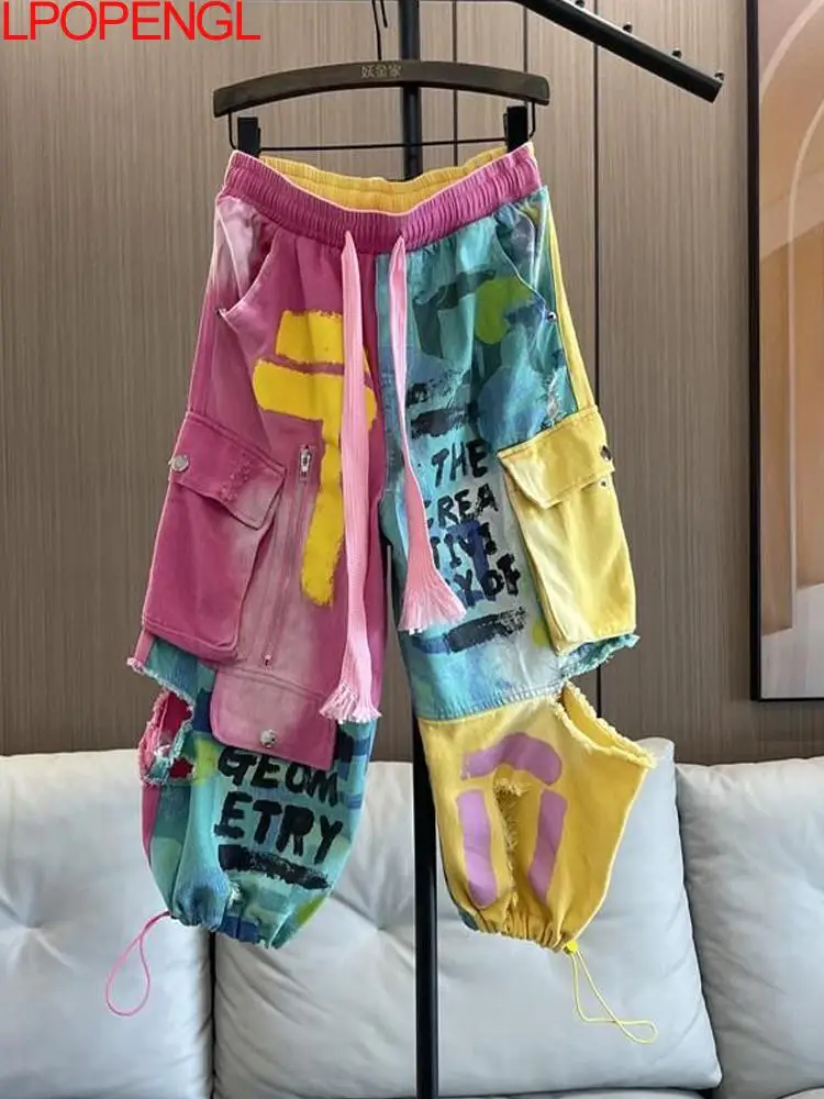 Personality Hip Hop Patchwork Pockets Jeans Women's Spring And Summer New Drawstring Ripped Streetwear Straight Leg Harem Pants 
Personality Hip Hop Patchwork Pockets Jeans Women's Spring And Summer New Drawstring Ripped Streetwear Straight Leg Harem Pants