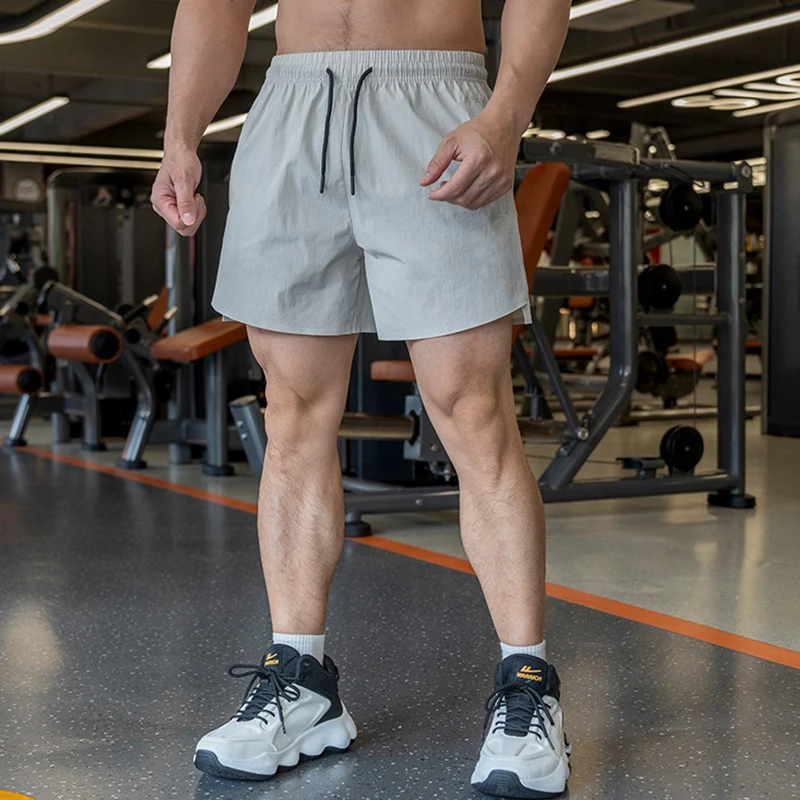 Men's Sport Workout Shorts Quick Dry Athletic Light weight Running Reflective Prints On Both Sides with Pockets Gym Pants Men
Men's Sport Workout Shorts Quick Dry Athletic Light weight Running Reflective Prints On Both Sides with Pockets Gym Pants Men