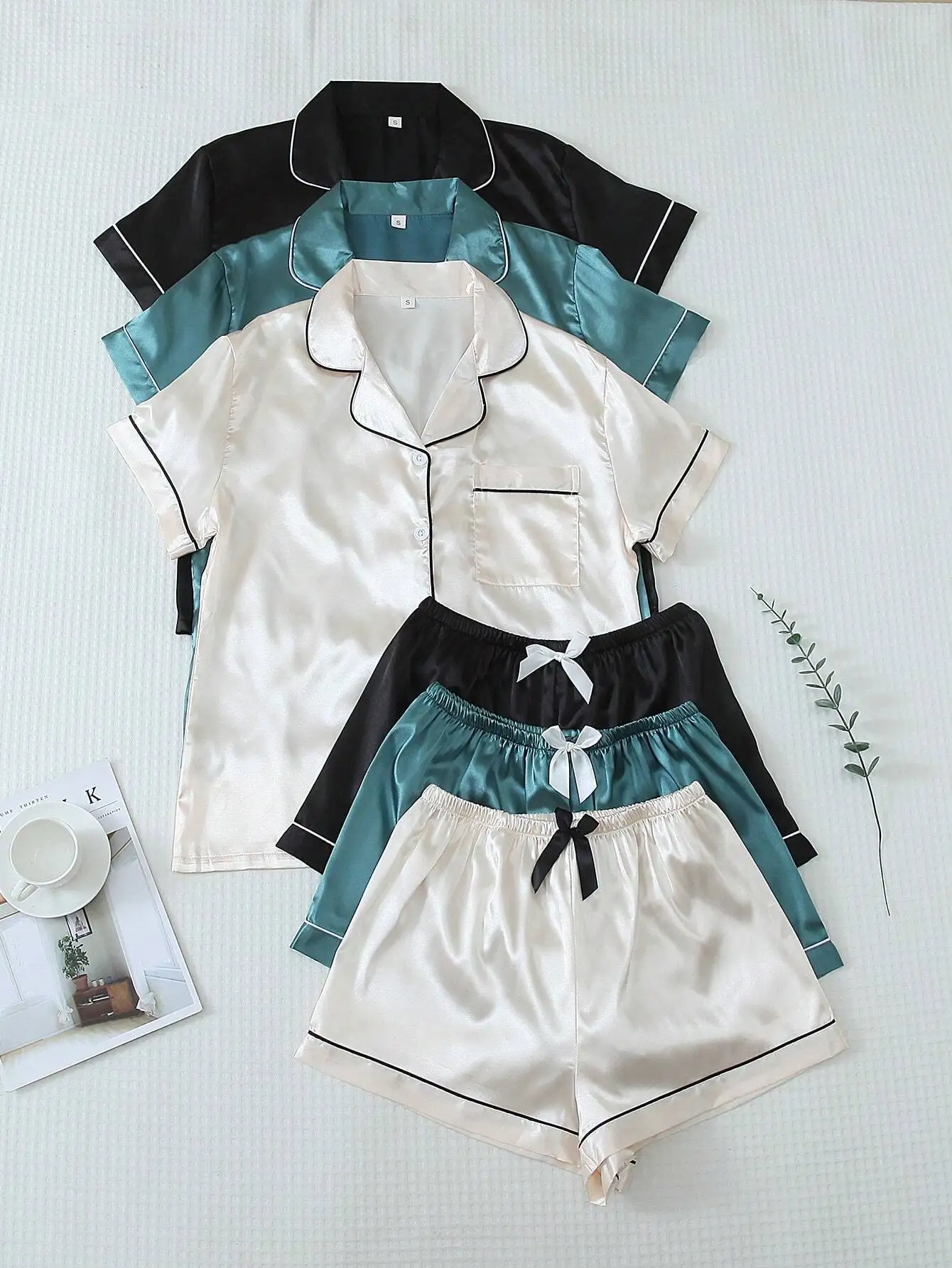 3-Piece Satin Pajama Set for Women: Short Sleeve Button-Up Top & Bowknot Shorts
3-Piece Satin Pajama Set for Women: Short Sleeve Button-Up Top & Bowknot Shorts