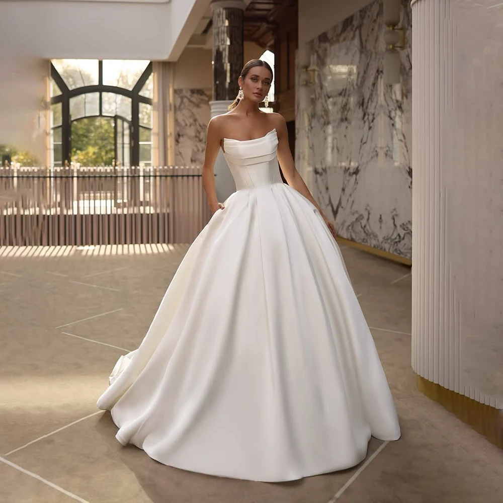Customized Fashion Strapless Sleeveless Satin Wedding Gown A-Line Backless Corset Lace Up Bridal Gowns vestidos de novia
Customized Fashion Strapless Sleeveless Satin Wedding Gown A-Line Backless Corset Lace Up Bridal Gowns vestidos de novia