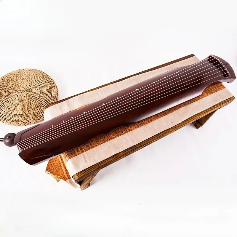 Tung Wood Guqin для начинающих, профессиональная тренировочная игра Guqin целебная Йога, музыкальные Струнные инструменты для медитации
Tung Wood Guqin для начинающих, профессиональная тренировочная игра Guqin целебная Йога, музыкальные Струнные инструменты для медитации