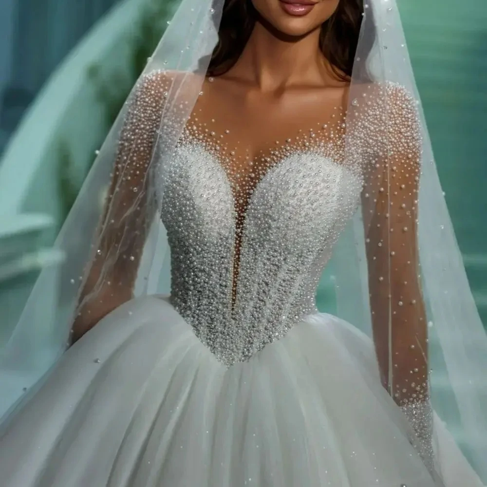 2025 Classic Church Wedding Dress Sheer Neck Heavy Pearls Long Sleeves A-line Bridal Bride Formal Gowns Vestidos De Noiva
2025 Classic Church Wedding Dress Sheer Neck Heavy Pearls Long Sleeves A-line Bridal Bride Formal Gowns Vestidos De Noiva