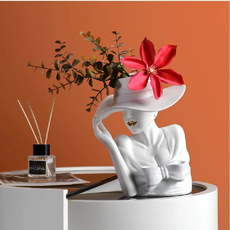Celebrity portrait sculpture flower resin handicraft flower pot home living room porch desktop decoration vase ornaments
Celebrity portrait sculpture flower resin handicraft flower pot home living room porch desktop decoration vase ornaments