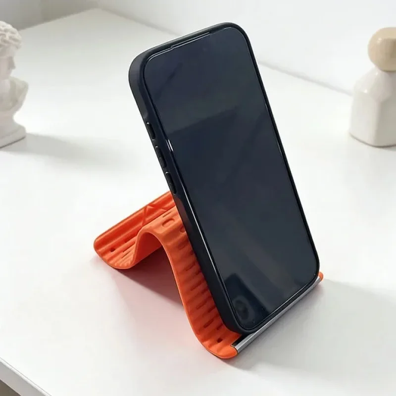 Foldable Flexible Silicone Phone Stand, Compatible with iPhone 17/16/15, iPad, Tablets and Laptops, Ideal for Desks and Travel, Portable Accessory
Foldable Flexible Silicone Phone Stand, Compatible with iPhone 17/16/15, iPad, Tablets and Laptops, Ideal for Desks and Travel, Portable Accessory