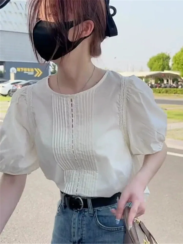 round Neck Hollow out Short Sleeve Lace Patchwork Bubble Sleeve Shirt Women's Spring Summer New Style Pleated Top Small Shirt
round Neck Hollow out Short Sleeve Lace Patchwork Bubble Sleeve Shirt Women's Spring Summer New Style Pleated Top Small Shirt