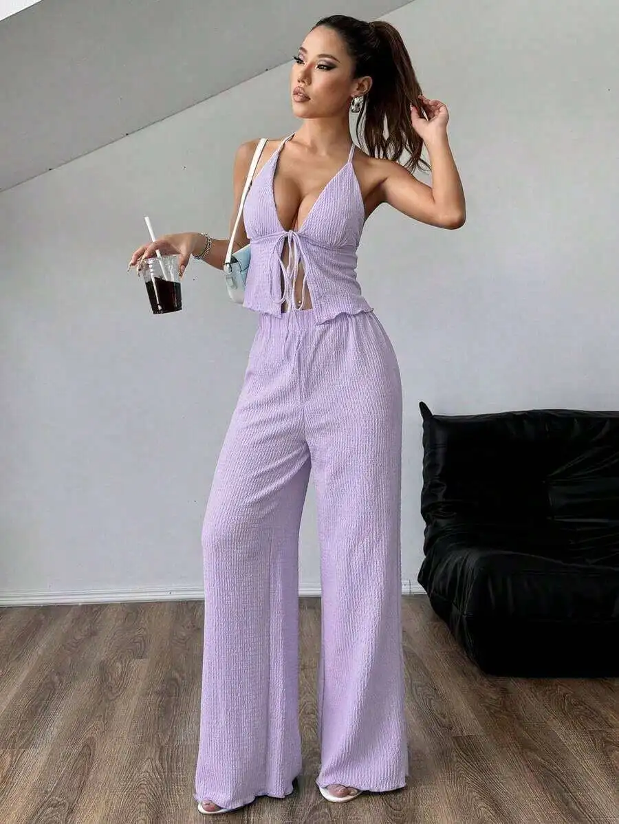 Textured Pleated Halter Neck Top And Loose Wide Leg Pants Set
Textured Pleated Halter Neck Top And Loose Wide Leg Pants Set