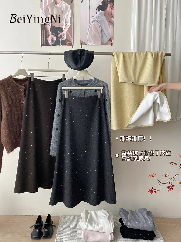 Beiyingni корейские кашемировые толстые юбки-миди трапециевидной формы для женщин, элегантная однотонная юбка с высокой талией, блестящая повседневная французская юбка OL Black Faldas
Beiyingni корейские кашемировые толстые юбки-миди трапециевидной формы для женщин, элегантная однотонная юбка с высокой талией, блестящая повседневная французская юбка OL Black Faldas