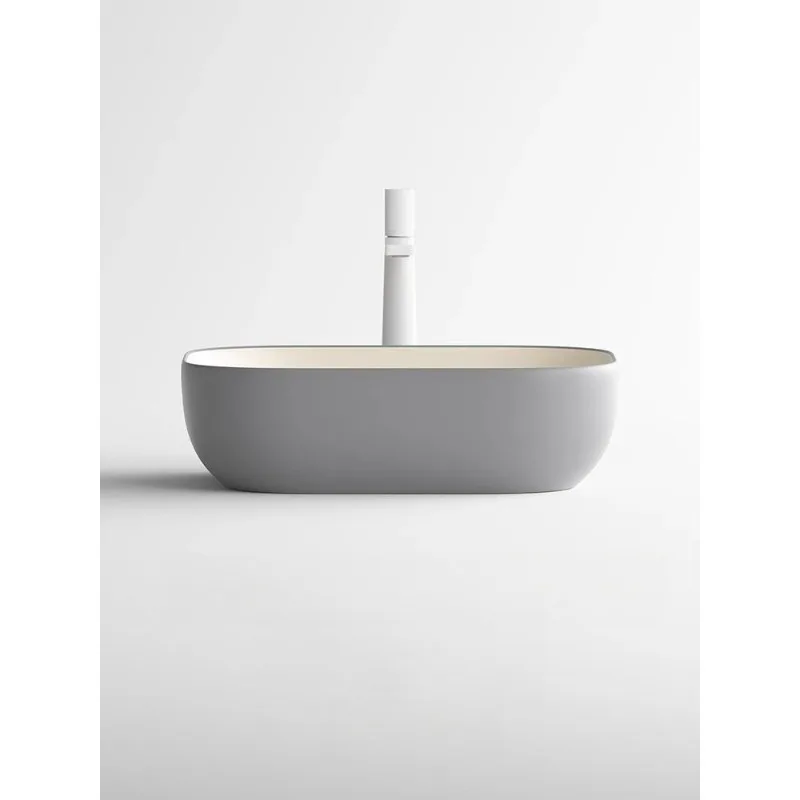 Nordic simple oval table basin household washbasin light luxury square milk coffee gray ceramic bathroom washbasin
Nordic simple oval table basin household washbasin light luxury square milk coffee gray ceramic bathroom washbasin