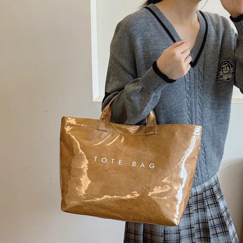 Waterproof Dupont Shoulder Bag, Fashionable Commuting, Large Capacity, Tear Resistant Kraft Paper Handbag
Waterproof Dupont Shoulder Bag, Fashionable Commuting, Large Capacity, Tear Resistant Kraft Paper Handbag