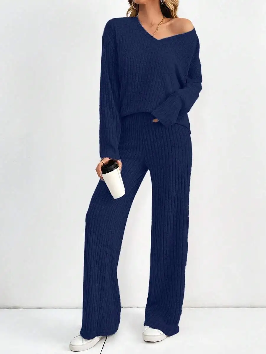 Women Solid Color Ribbed Knit V-Neck Top And Wide Leg Pants Set
Women Solid Color Ribbed Knit V-Neck Top And Wide Leg Pants Set