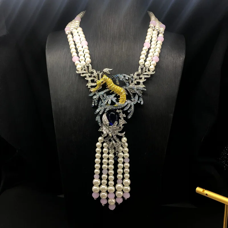 French Retro Elegant Multi-Layered Pearl Bead Necklace Seahorse Pendant Design Inlaid Rhinestone Tassel Women'S Jewelry
French Retro Elegant Multi-Layered Pearl Bead Necklace Seahorse Pendant Design Inlaid Rhinestone Tassel Women'S Jewelry