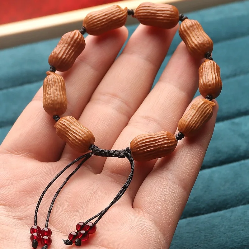 Hand Carved Small Olive Pit Peanut Bracelet Old Oil Pit Plain String for Good Fortune and Abundant Offspring Gifts
Hand Carved Small Olive Pit Peanut Bracelet Old Oil Pit Plain String for Good Fortune and Abundant Offspring Gifts