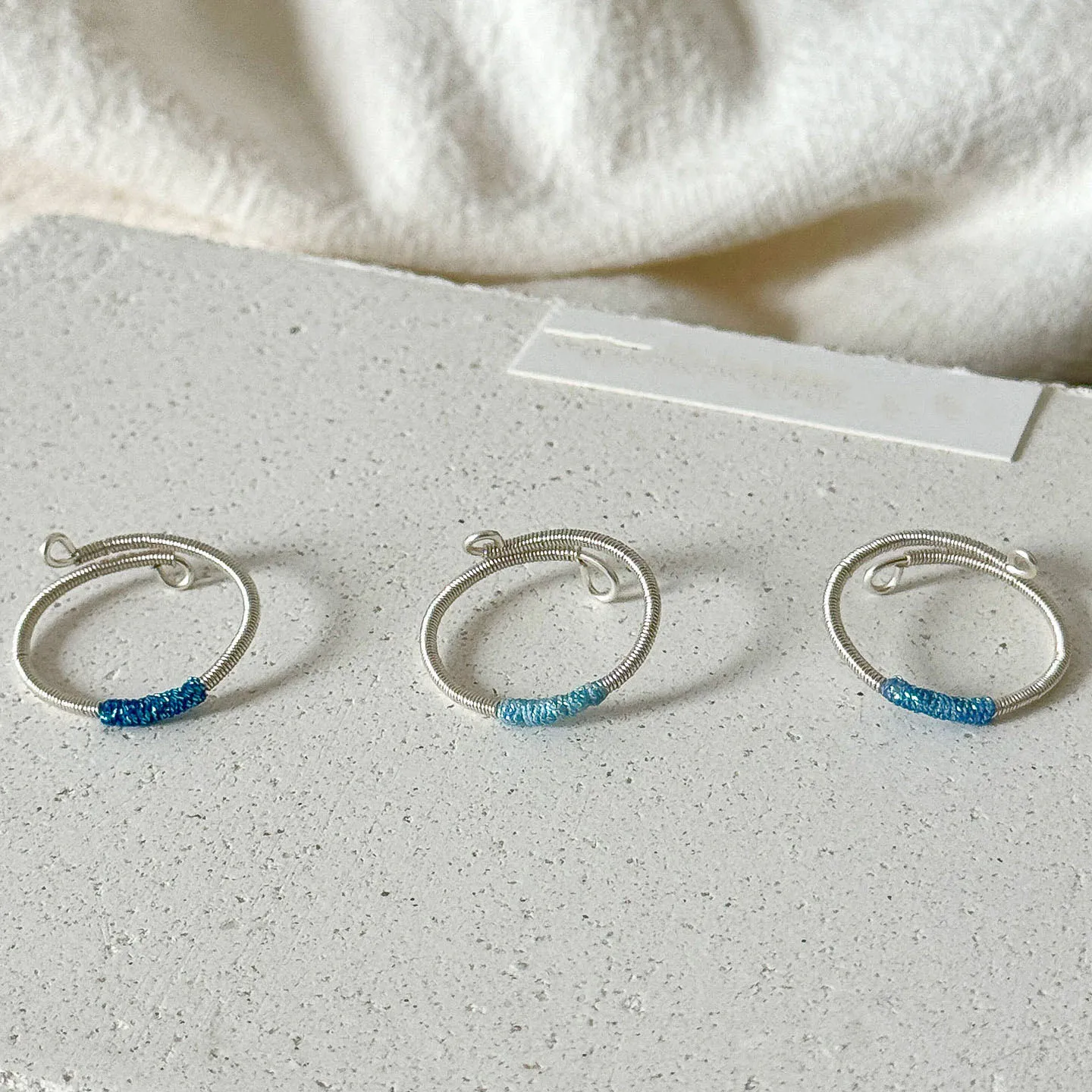 Light blue braided rope winding rings for women with original design sense new in simple ring adjustable party jewelry gift
Light blue braided rope winding rings for women with original design sense new in simple ring adjustable party jewelry gift