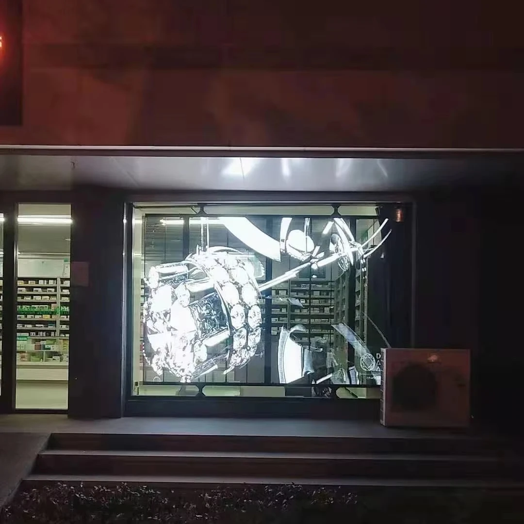 Прозрачный LED-экран с индивидуальными размерами для внутреннего использования, прозрачная LED-сетка для витрин магазинов и демонстрационных шкафов
Прозрачный LED-экран с индивидуальными размерами для внутреннего использования, прозрачная LED-сетка для витрин магазинов и демонстрационных шкафов