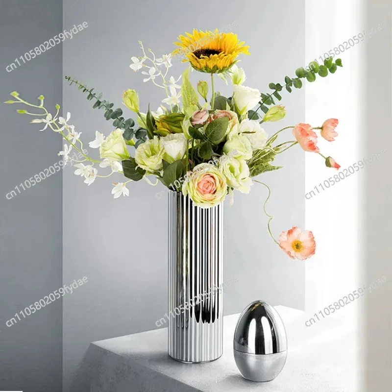 Stainless steel flower pot flower ornament home living room coffee table flower arrangement decorative vase simple creative
Stainless steel flower pot flower ornament home living room coffee table flower arrangement decorative vase simple creative