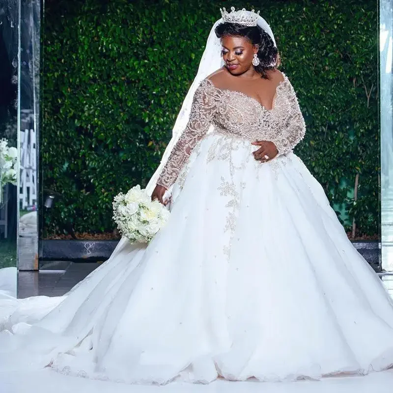 Customized Plus Size A Line Custom Made Wedding Bridal Gowns Jewel Neck Long Sleeve Beaded Sequined Pearls Church Bride Dress
Customized Plus Size A Line Custom Made Wedding Bridal Gowns Jewel Neck Long Sleeve Beaded Sequined Pearls Church Bride Dress