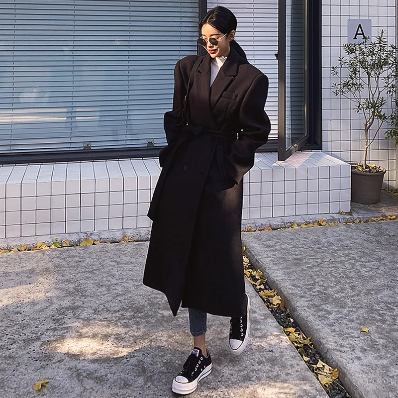 Black ladies thickened tweed coat long style woolen overcoat Double-breasted belt autumn and winter
Black ladies thickened tweed coat long style woolen overcoat Double-breasted belt autumn and winter