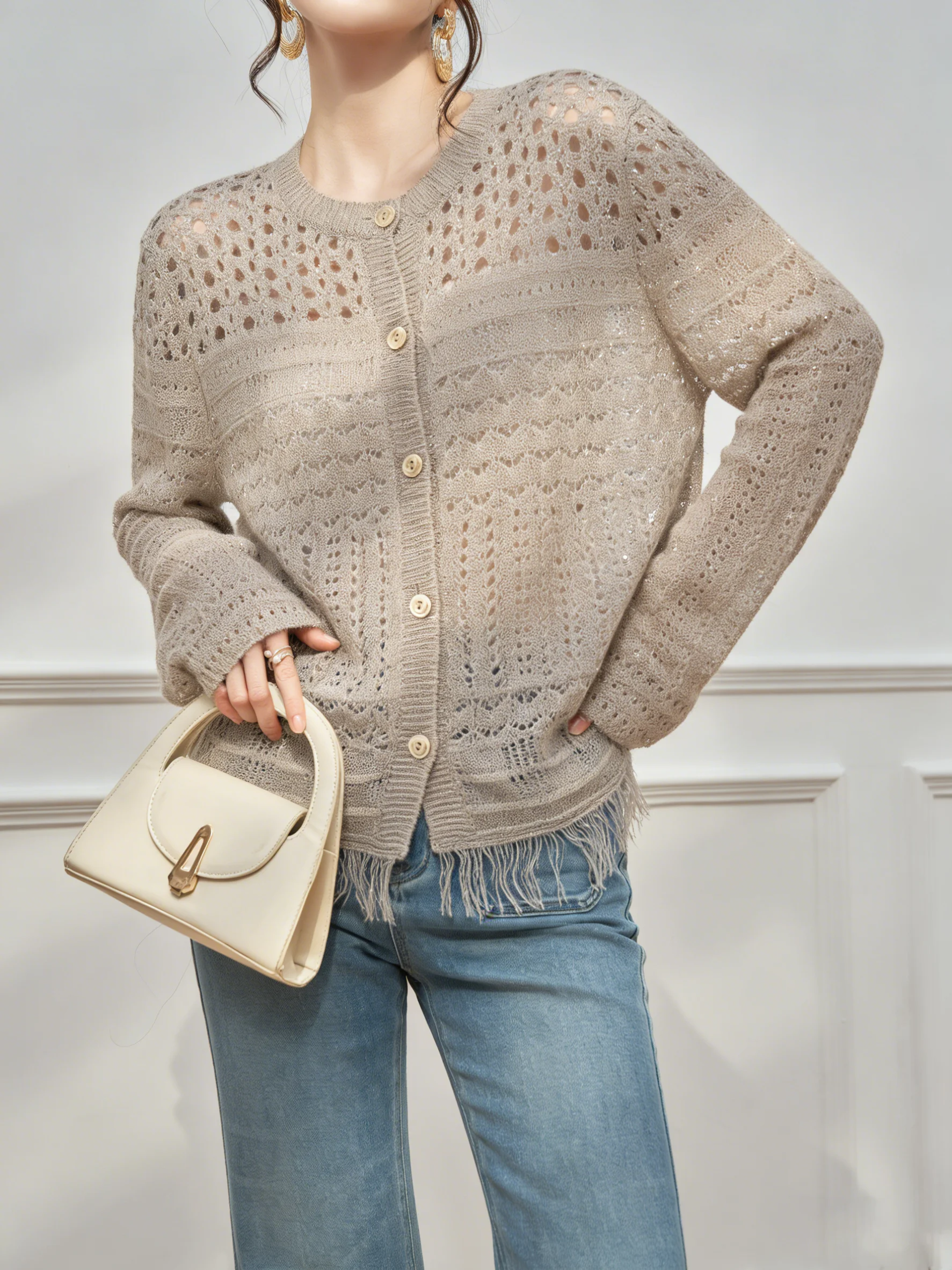 Spring 2026 Oatmeal Knitted Sweater Hollow out Tassel Korean Style Atmosphere Feeling Women's Fashionable Top Commute Elegant
Spring 2026 Oatmeal Knitted Sweater Hollow out Tassel Korean Style Atmosphere Feeling Women's Fashionable Top Commute Elegant