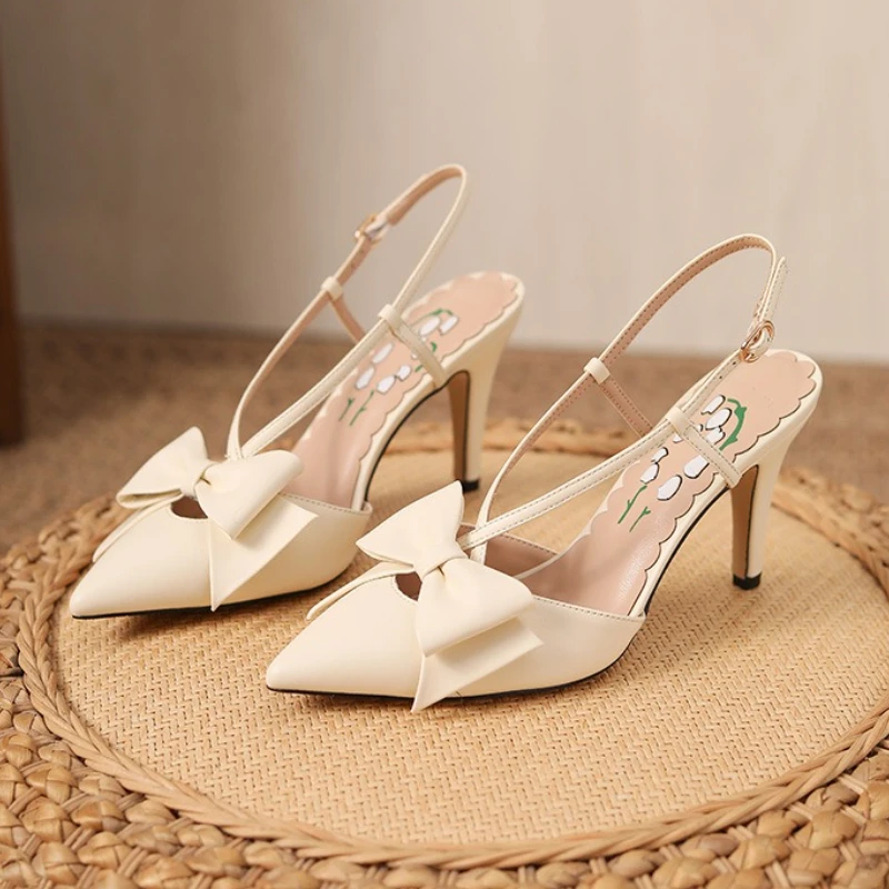 Элегантные босоножки на высоком каблуке с бантом, женские пикантные туфли с острым носком и пряжкой на тонком высоком каблуке, модные банкетные модельные туфли
Элегантные босоножки на высоком каблуке с бантом, женские пикантные туфли с острым носком и пряжкой на тонком высоком каблуке, модные банкетные модельные туфли