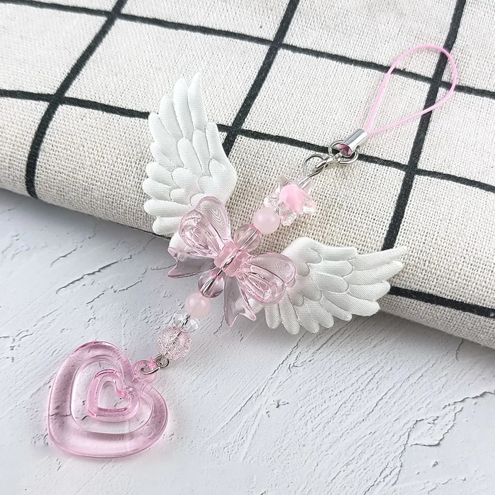 Lovely Wings Bow Heart Phone Strap Pendant Fashion Women Sweet Keychain Lanyard For iPhone Case Decoration Accessories Gift
Lovely Wings Bow Heart Phone Strap Pendant Fashion Women Sweet Keychain Lanyard For iPhone Case Decoration Accessories Gift