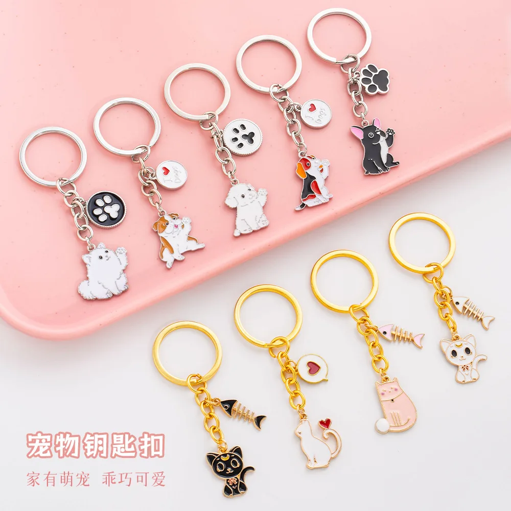 Metal keychain, cat and dog pet keychain pendant, round cute footprint key chain, heart backpack pendant 
Metal keychain, cat and dog pet keychain pendant, round cute footprint key chain, heart backpack pendant