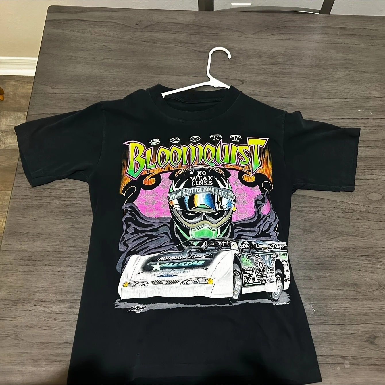 90s Scott Blumquist Retro Racing T-Shirt - Black Retro Mud Late Pattern with Flame and Helmet Design
90s Scott Blumquist Retro Racing T-Shirt - Black Retro Mud Late Pattern with Flame and Helmet Design