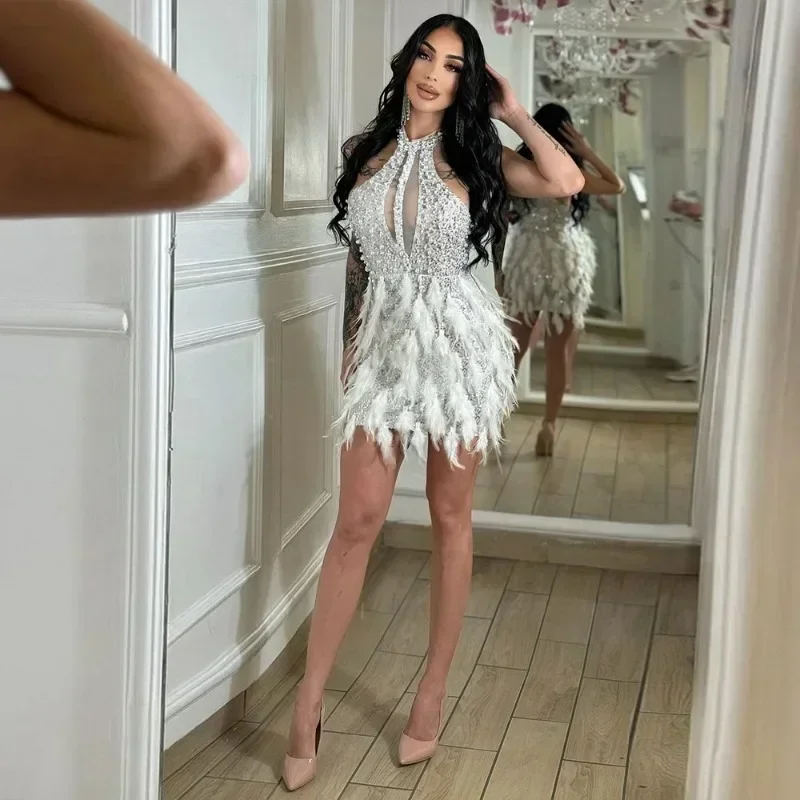 GUWU Sequined Feather Sleeveless O-neck Mesh Bodycon Mini Women Dress New Sexy Holiday Party Evening Dresses Vestidos
GUWU Sequined Feather Sleeveless O-neck Mesh Bodycon Mini Women Dress New Sexy Holiday Party Evening Dresses Vestidos