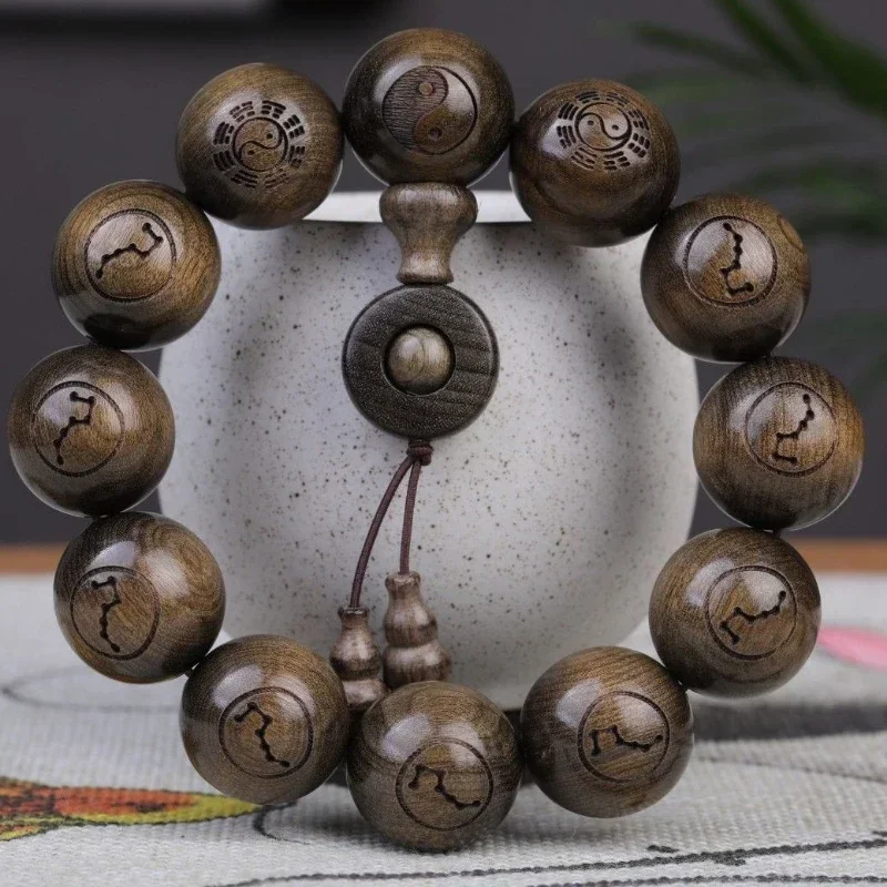 Taoist bracelet with nine words of truth, golden silk Nan Yin Chen wood bracelet, men's atmospheric operation bracelet jewelry
Taoist bracelet with nine words of truth, golden silk Nan Yin Chen wood bracelet, men's atmospheric operation bracelet jewelry