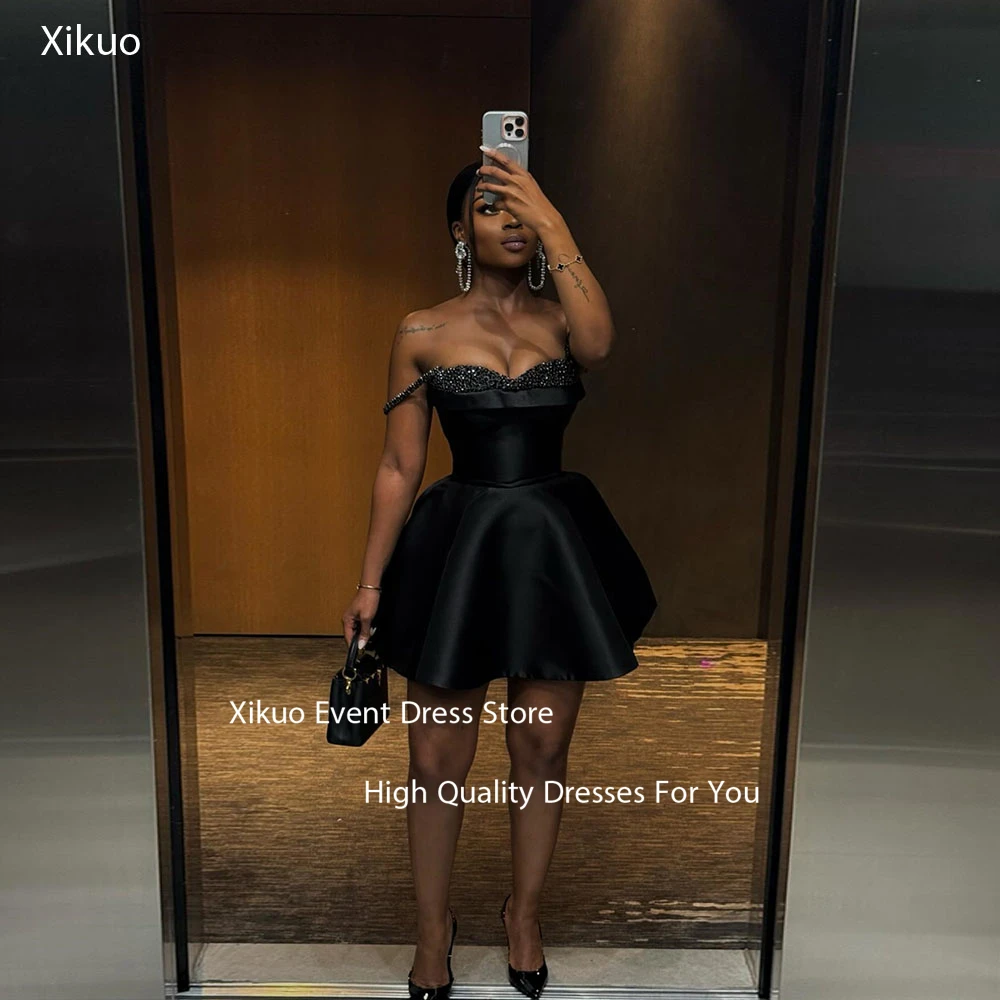Xikuo Black Sweetheart Prom Gowns Bling Beaded Evening Dress Spaghetti Straps A Line Short Length Homecoming Dresses Customized
Xikuo Black Sweetheart Prom Gowns Bling Beaded Evening Dress Spaghetti Straps A Line Short Length Homecoming Dresses Customized
