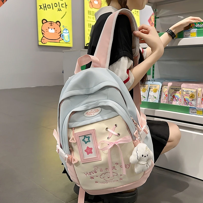Новинка 2025 года, кавайный рюкзак для девочек, желтая, розовая школьная сумка с рисунком медведя, подвесная лента, украшение, повседневный дорожный рюкзак
Новинка 2025 года, кавайный рюкзак для девочек, желтая, розовая школьная сумка с рисунком медведя, подвесная лента, украшение, повседневный дорожный рюкзак