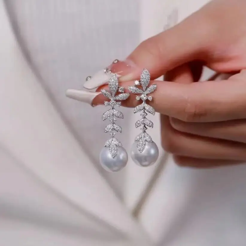 gergous 10-11mm south sea round white pearl dangle earring 925s
gergous 10-11mm south sea round white pearl dangle earring 925s