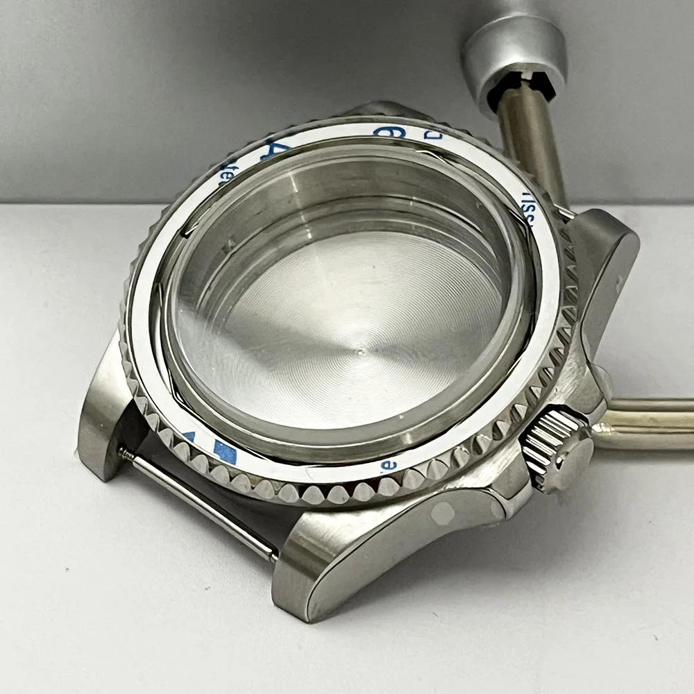 The 40mm NH35 case is suitable for GMT watch modules, NH35, NH36, Miyata 8205, 8215, flat glass without magnifying glass
The 40mm NH35 case is suitable for GMT watch modules, NH35, NH36, Miyata 8205, 8215, flat glass without magnifying glass