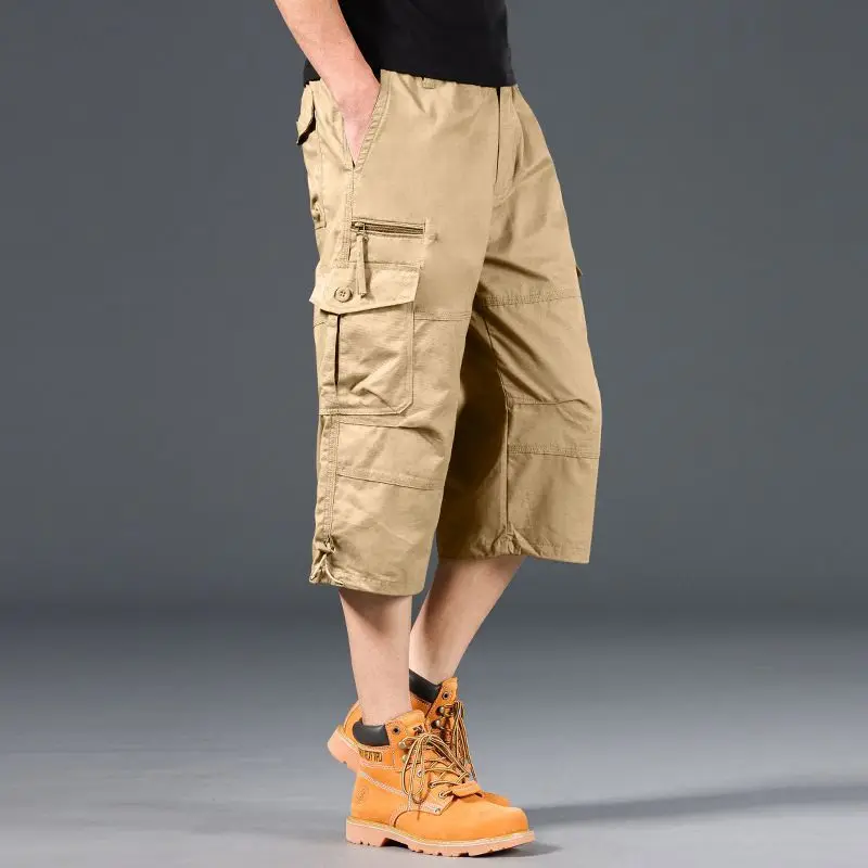 2025 New Mens Cargo Shorts Knee Pants Zipper Pocket Summer Cotton Shorts Climbing Jogger Elastic Waist Sports Wear
2025 New Mens Cargo Shorts Knee Pants Zipper Pocket Summer Cotton Shorts Climbing Jogger Elastic Waist Sports Wear