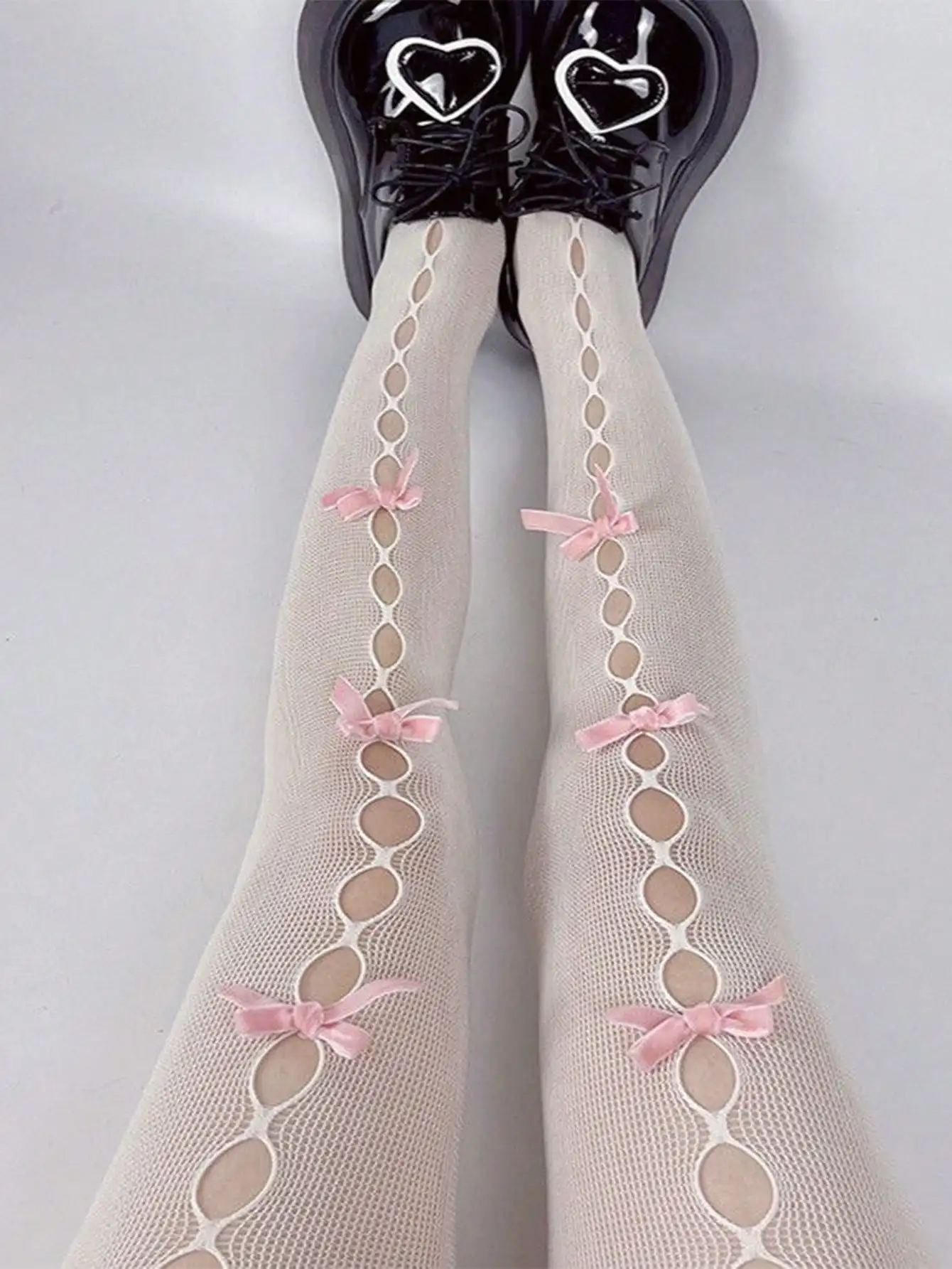 Y2K Lolita Pink Bow Fishnet Thigh High Stockings with Hollow Cutouts for JK Style
Y2K Lolita Pink Bow Fishnet Thigh High Stockings with Hollow Cutouts for JK Style