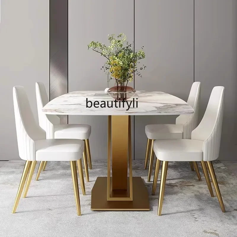 A Modern simple and high-end light luxury rock slab dining table, household small apartment marble table, rectangular
A Modern simple and high-end light luxury rock slab dining table, household small apartment marble table, rectangular