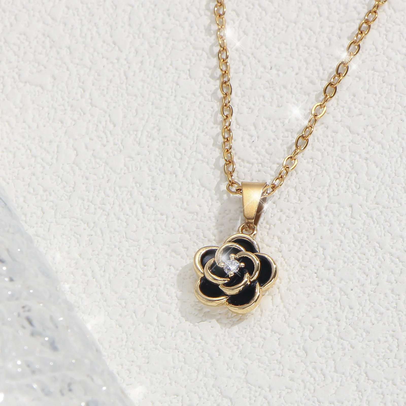 Golden Black Enamel Camellia Pendant Necklace Center Inlaid Cubic Zirconia Elegant Jewelry Gift For Women
Golden Black Enamel Camellia Pendant Necklace Center Inlaid Cubic Zirconia Elegant Jewelry Gift For Women