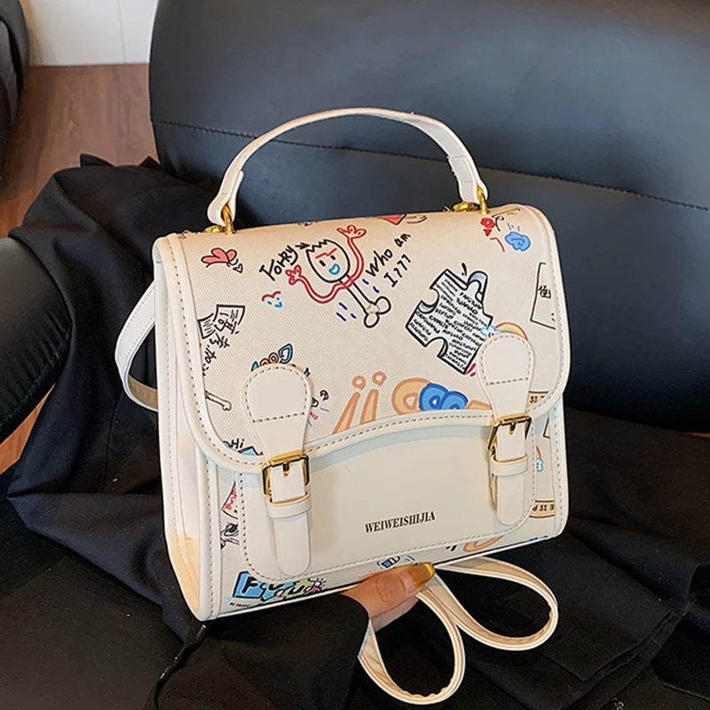 Designer Graffiti Handbag Small Square Bag Korean Preppy Style Backbag Casual Cartoon Travel Backpack Versatile Shoulder Bags
Designer Graffiti Handbag Small Square Bag Korean Preppy Style Backbag Casual Cartoon Travel Backpack Versatile Shoulder Bags